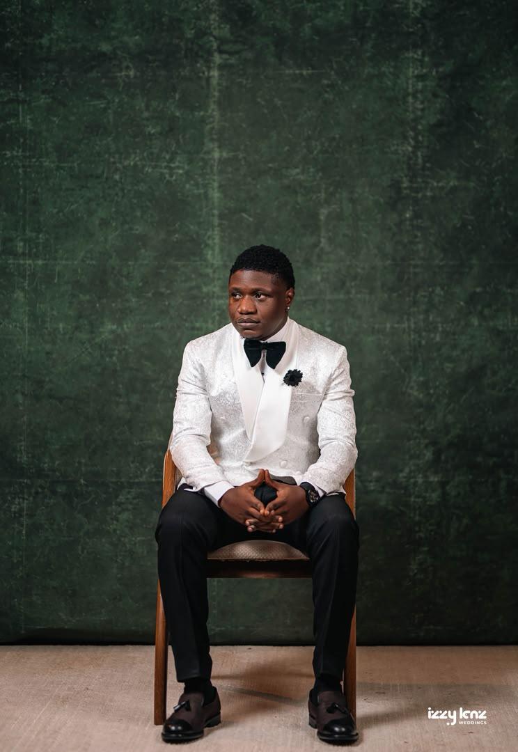 Tomiwa Adeniyi seated portrait